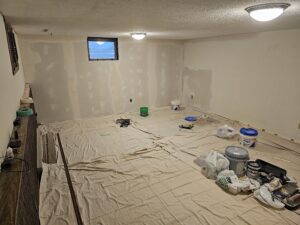 Basement living room remodel under construction.