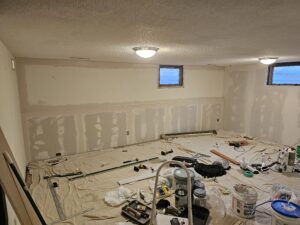 Basement living room remodel under construction.
