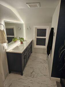 Master Suite vanity with schluter ditra heat tile floor.