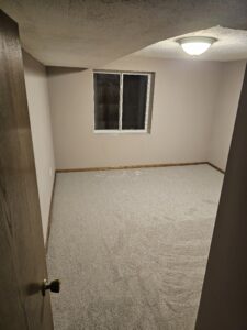 after photo of Basement bedroom remodel after egress installation.