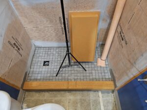 tile shower under construction after floor installation.
