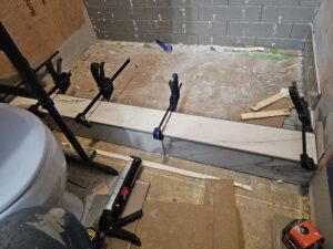 shower curb under construction.
