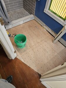 bathroom floor with underlayment