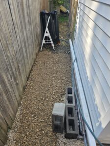 finished landscape rock around shed